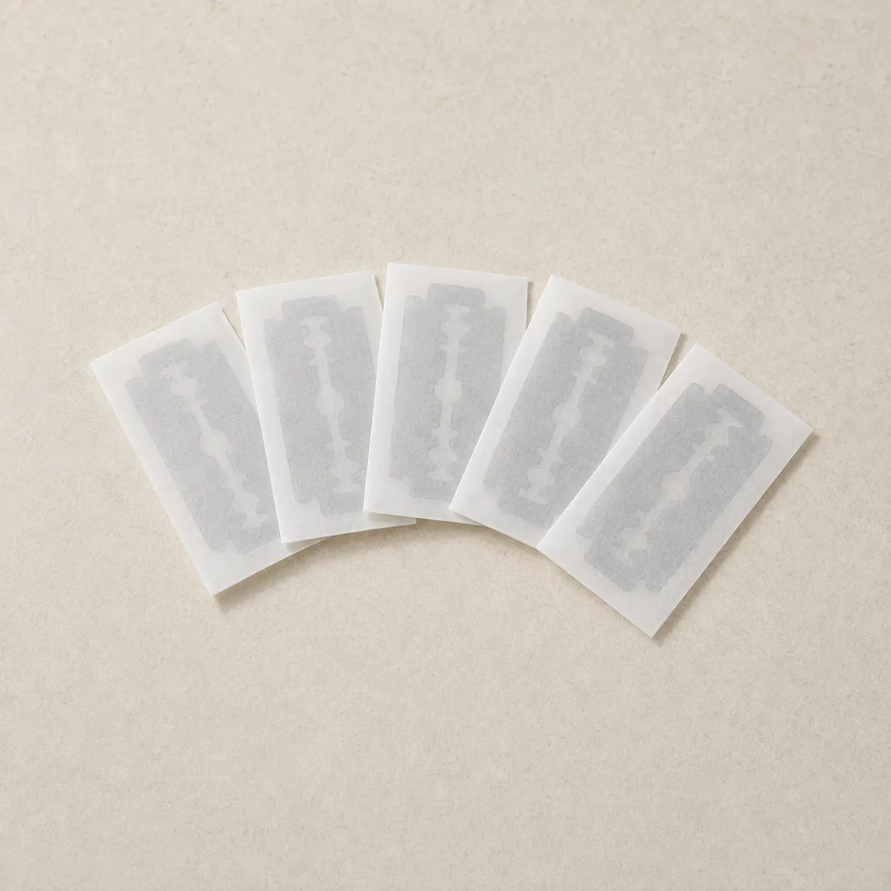 Five double-edge blades included with the set